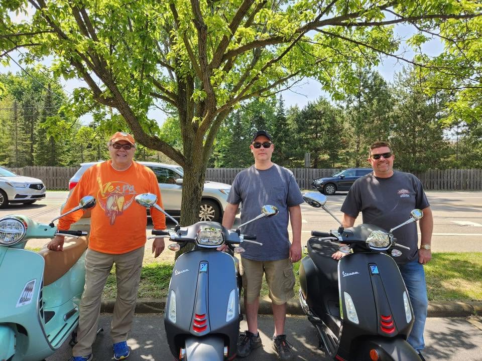 Vespa Club of Erie members gathered together