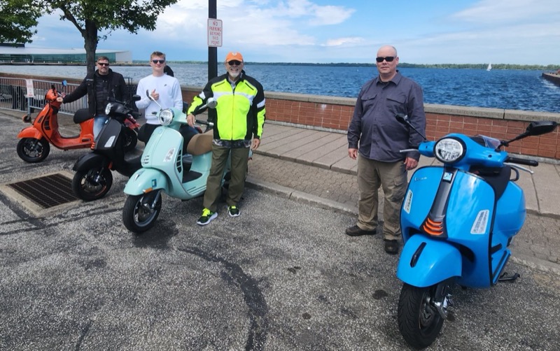 Vespa Club of Erie riders on the road